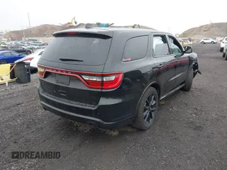 2017 Dodge Durango R/T with VIN 1C4SDJCTXHC878876, listed as a IAAI auction lot 42175360 with 61,323 mi miles and . Bid and sale history available at carsss.com. Image 4.