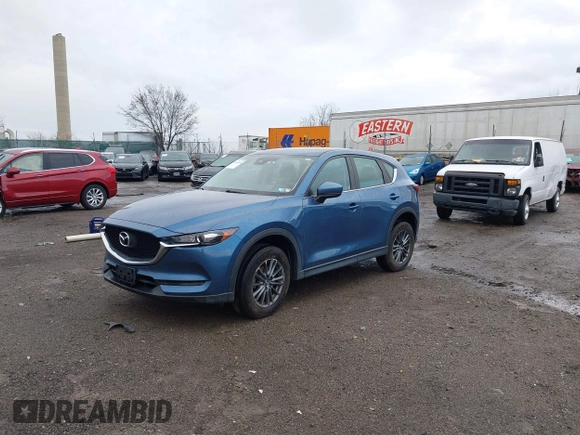 2019 Mazda CX-5 Sport with VIN JM3KFBBM5K0668678, listed as a IAAI auction lot 41811146 with 102,634 mi miles and . Bid and sale history available at DreamBid. Image 18.