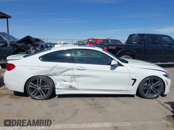 2019 BMW 4 Series 440i z VIN WBA4W7C56KAG52201, wystawiony jako IAAI lot #41639179 z przebiegiem 39 225 mil mil oraz . Historia ofert i sprzedaży dostępna na DreamBid. Obrazek 13.