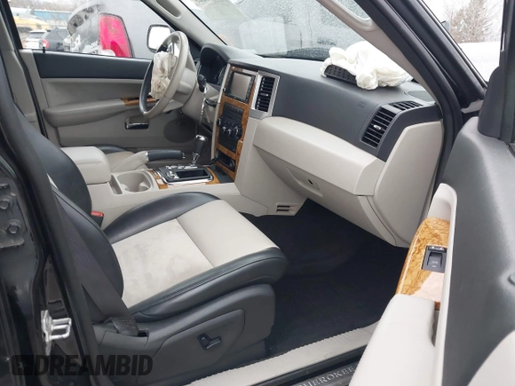 2009 Jeep Grand Cherokee Limited with VIN 1J8HR58T89C541970, listed as a IAAI auction lot 41189623 with 74,161 mi miles. Bid and sale history available at carsss.com. Image 5.