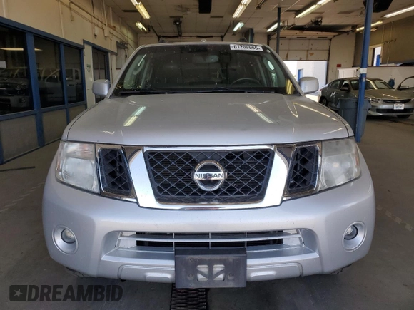 2012 Nissan Pathfinder Silver Edition z VIN 5N1AR1NB7CC629750, wystawiony jako Copart lot #61209965 z przebiegiem 164 479 mil mil oraz Szkoda całkowita • Salvage title. Historia ofert i sprzedaży dostępna na DreamBid. Obrazek 5.