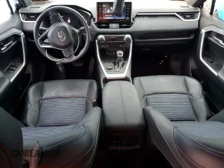 2021 Toyota RAV4 Hybrid XSE with VIN 4T3E6RFV0MU038650, listed as a Copart auction lot 60345725 with 24,124 mi miles and Salvage title. Bid and sale history available at DreamBid. Image 8.