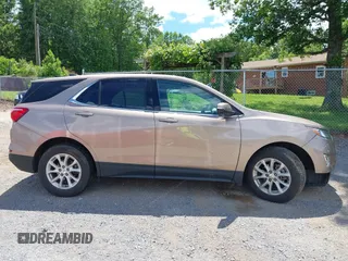 2019 Chevrolet Equinox LT z VIN 2GNAXTEVXK6232662, wystawiony jako IAAI lot #42331522 z przebiegiem 92 090 mil mil oraz . Historia ofert i sprzedaży dostępna na DreamBid. Obrazek 13.