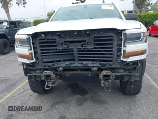 2018 Chevrolet Silverado 1500 Custom with VIN 1GCRCPEH6JZ274743, listed as a IAAI auction lot 42099900 with 61,008 mi miles and . Bid and sale history available at DreamBid. Image 6.