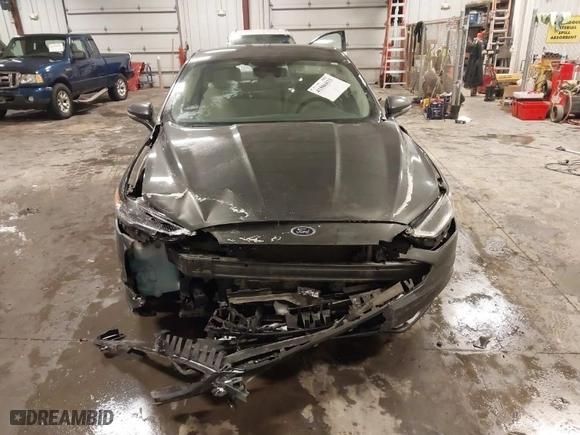 2018 Ford Fusion Hybrid Titanium with VIN 3FA6P0RU4JR147831, listed as a IAAI auction lot 41586033 with 101,088 mi miles. Bid and sale history available at carsss.com. Image 12.
