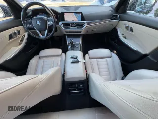 2021 BMW 3 Series 330i with VIN 3MW5R1J04MBB48483, listed as a Copart auction lot 46145125 with 128,555 mi miles and Clean Title. Bid and sale history available at carsss.com. Image 9.