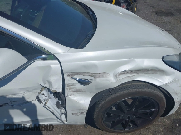 2019 Tesla Model 3 Mid Range with VIN 5YJ3E1EA7KF425127, listed as a IAAI auction lot 41886436 with 87,236 mi miles and . Bid and sale history available at carsss.com. Image 6.