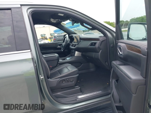2023 Chevrolet Suburban Premier with VIN 1GNSCFKD2PR377493, listed as a IAAI auction lot 42426988 with 71,365 mi miles and . Bid and sale history available at DreamBid. Image 5.