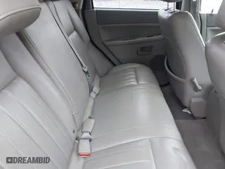 2005 Jeep Grand Cherokee Laredo with VIN 1J4GR48K35C702010, listed as a IAAI auction lot 41043017 with 150,565 mi miles. Bid and sale history available at carsss.com. Image 8.