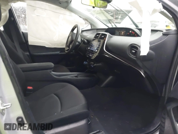 2022 Toyota Prius L Eco with VIN JTDKAMFU1N3177055, listed as a IAAI auction lot 41506862 with 121,318 mi miles and . Bid and sale history available at DreamBid. Image 5.