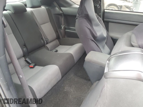 2014 Scion tC z VIN JTKJF5C72E3066945, wystawiony jako Copart lot #56125905 z przebiegiem Nie podano mil oraz Szkoda całkowita • Salvage title. Historia ofert i sprzedaży dostępna na DreamBid. Obrazek 10.
