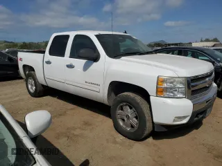 2011 Chevrolet Silverado 1500 LT with VIN 3GCPKSE37BG112705, listed as a Copart auction lot 52622045 with 173,202 mi miles and Salvage Title. Bid and sale history available at DreamBid. Image 4.