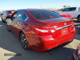 2016 Nissan Altima SR with VIN 1N4AL3AP5GC128614, listed as a IAAI auction lot 41625773 with 123,549 mi miles and . Bid and sale history available at DreamBid. Image 14.