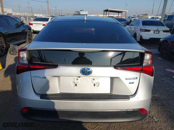 2019 Toyota Prius L Eco with VIN JTDKARFU2K3082593, listed as a IAAI auction lot 41657698 with 239,412 mi miles. Bid and sale history available at carsss.com. Image 16.