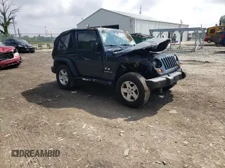 2008 Jeep Wrangler X with VIN 1J4FA24158L563572, listed as a Copart auction lot 58667265 with 162,649 mi miles and Salvage title. Bid and sale history available at DreamBid. Image 13.