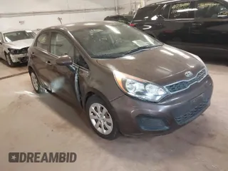 2013 Kia Rio SX with VIN KNADN5A32D6136879, listed as a IAAI auction lot 41815817 with 110,763 mi miles. Bid and sale history available at carsss.com. Image 1.