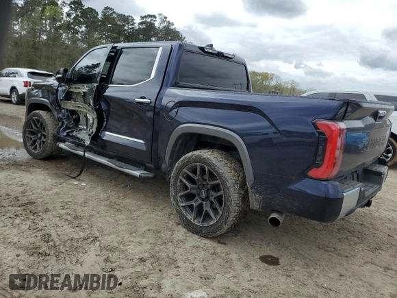 2023 Toyota Tundra 1794 Edition with VIN 5TFMA5AB7PX023918, listed as a Copart auction lot 49638235 with 58,499 mi miles and Salvage title. Bid and sale history available at DreamBid. Image 2.
