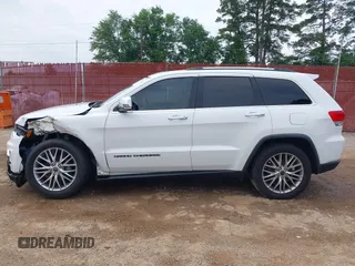 2018 Jeep Grand Cherokee Sterling with VIN 1C4RJEBG8JC289169, listed as a IAAI auction lot 42267113 with 77,274 mi miles and . Bid and sale history available at DreamBid. Image 14.