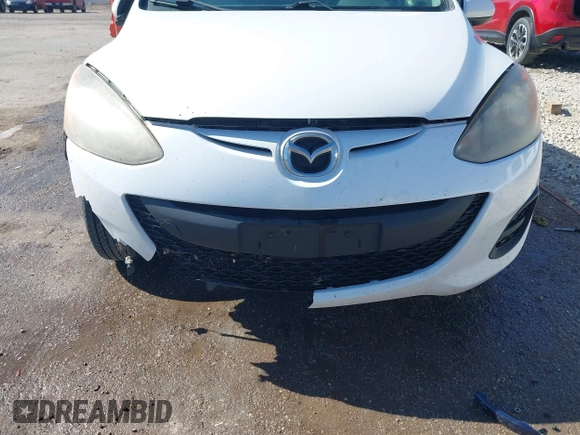 2014 Mazda 2 Sport with VIN JM1DE1KY0E0175562, listed as a IAAI auction lot 42023803 with 247,411 mi miles and . Bid and sale history available at carsss.com. Image 6.