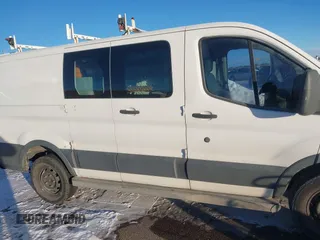 2015 Ford Transit Cargo with VIN 1FTNR1ZM0FKA78069, listed as a IAAI auction lot 41396797 with 96,001 mi miles and . Bid and sale history available at DreamBid. Image 6.