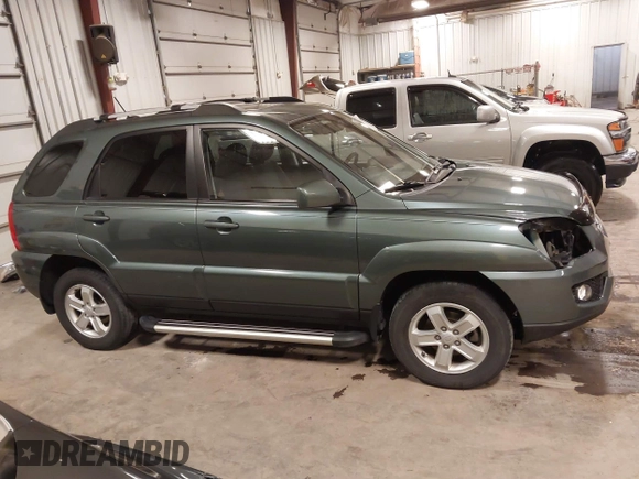 2009 Kia Sportage LX with VIN KNDJE723097558182, listed as a IAAI auction lot 41295142 with 147,200 mi miles. Bid and sale history available at carsss.com. Image 14.