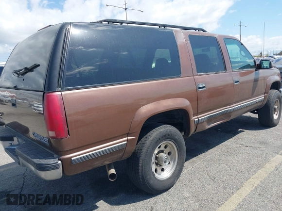 1999 Chevrolet Suburban with VIN 1GNGK26J9XJ494147, listed as a IAAI auction lot 41945149 with 102,652 mi miles. Bid and sale history available at carsss.com. Image 6.