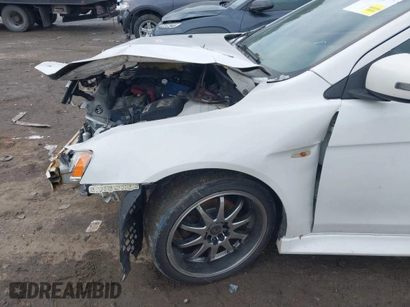 2017 Mitsubishi Lancer ES with VIN JA32V2FW8HU006570, listed as a IAAI auction lot 41366177 with 138,247 mi miles. Bid and sale history available at carsss.com. Image 6.