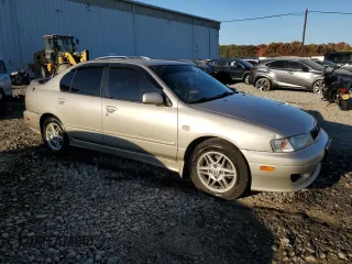 2002 Infiniti G20 Luxury z VIN JNKCP11A72T507242, wystawiony jako Copart lot #77325544 z przebiegiem 172 351 mil mil oraz Szkody całkowita. Historia ofert i sprzedaży dostępna na DreamBid. Obrazek 4.