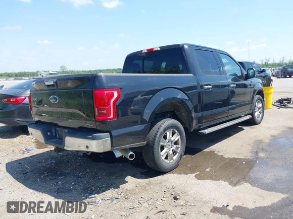 2015 Ford F-150 XL with VIN 1FTEW1CFXFFA37573, listed as a IAAI auction lot 42054120 with 125,822 mi miles. Bid and sale history available at carsss.com. Image 4.
