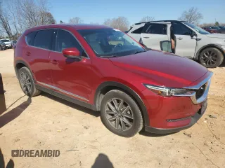 2018 Mazda CX-5 Grand Touring with VIN JM3KFADM5J0350937, listed as a Copart auction lot 46525965 with 59,478 mi miles and Salvage Title. Bid and sale history available at DreamBid. Image 4.