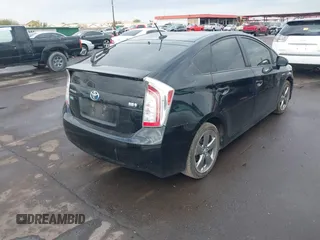 2013 Toyota Prius One with VIN JTDKN3DU4D5617063, listed as a IAAI auction lot 41461279 with 247,219 mi miles. Bid and sale history available at carsss.com. Image 4.
