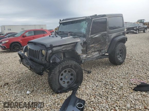 2017 Jeep Wrangler Willys Wheeler with VIN 1C4AJWAG9HL673766, listed as a Copart auction lot 43132555 with 129,422 mi miles and Salvage Title. Bid and sale history available at DreamBid. Image 1.