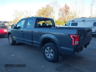 2015 Ford F-150 XLT with VIN 1FTEX1E88FKF22622, listed as a IAAI auction lot 41402747 with 214,667 mi miles. Bid and sale history available at carsss.com. Image 3.