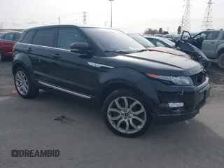 2013 Land Rover Range Rover Evoque Prestige Premium z VIN SALVV2BG8DH808674, wystawiony jako IAAI lot #41590565 z przebiegiem 109 191 mil mil oraz . Historia ofert i sprzedaży dostępna na DreamBid. Obrazek 1.