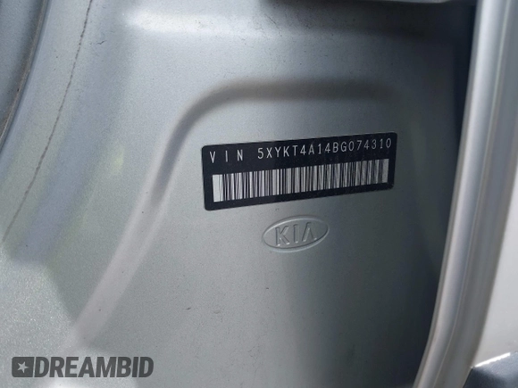 2011 Kia Sorento LX with VIN 5XYKT4A14BG074310, listed as a IAAI auction lot 42119815 with 215,660 mi miles. Bid and sale history available at carsss.com. Image 9.