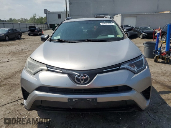 2016 Toyota RAV4 LE with VIN 2T3BFREV0GW424719, listed as a Copart auction lot 55050585 with 249,560 mi miles and Salvage Title. Bid and sale history available at DreamBid. Image 5.