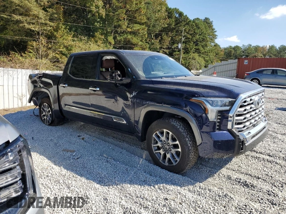 2023 Toyota Tundra 1794 Edition with VIN 5TFMA5AB9PX021944, listed as a Copart auction lot 77756214 with 76,260 mi miles and Salvage title. Bid and sale history available at DreamBid. Image 4.