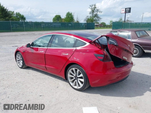 2018 Tesla Model 3 Long Range Battery with VIN 5YJ3E1EA8JF031683, listed as a IAAI auction lot 39275313 with 136,939 mi miles and . Bid and sale history available at DreamBid. Image 3.