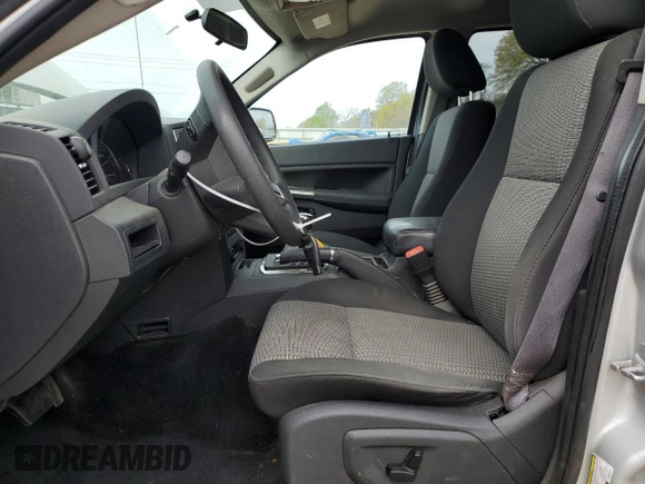 2009 Jeep Grand Cherokee Laredo with VIN 1J8GR48K89C500719, listed as a Copart auction lot 51425085 with 127,896 mi miles and Salvage Title. Bid and sale history available at carsss.com. Image 7.