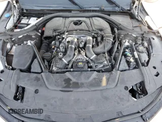 2016 BMW 7 Series 750i xDrive with VIN WBA7B0C59GG526741, listed as a Copart auction lot 86312384 with 90,360 mi miles and Salvage title. Bid and sale history available at DreamBid. Image 11.