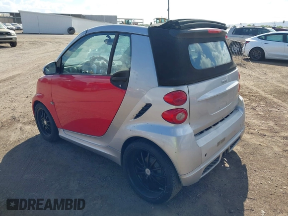 2009 Smart fortwo Passion with VIN WMEEK31X99K294322, listed as a IAAI auction lot 42014658 with Not Provided miles. Bid and sale history available at carsss.com. Image 3.