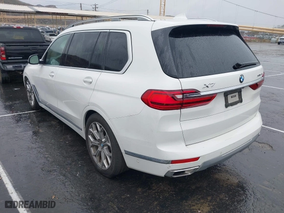 2019 BMW X7 xDrive40i with VIN 5UXCW2C57KL084137, listed as a IAAI auction lot 41662958 with 34,751 mi miles. Bid and sale history available at carsss.com. Image 3.