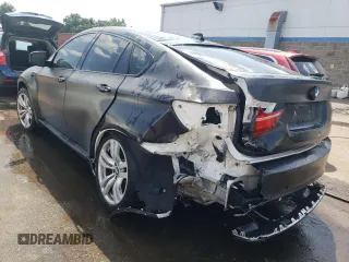 2013 BMW X6 M with VIN 5YMGZ0C50D0C40144, listed as a Copart auction lot 64889554 with 91,024 mi miles and Salvage Title. Bid and sale history available at carsss.com. Image 2.