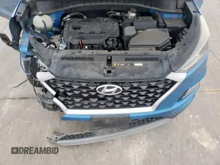2019 Hyundai Tucson Sport z VIN KM8J33AL5KU861199, wystawiony jako Copart lot #55126555 z przebiegiem 75 432 mil mil oraz Szkoda całkowita • Salvage title. Historia ofert i sprzedaży dostępna na DreamBid. Obrazek 12.