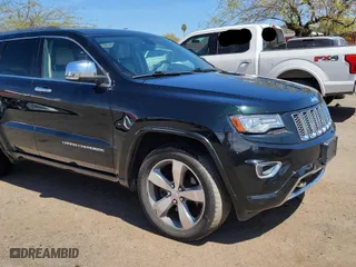 2014 Jeep Grand Cherokee Overland with VIN 1C4RJFCT7EC187319, listed as a Copart auction lot 53850035 with 98,314 mi miles and Clean Title. Bid and sale history available at carsss.com. Image 1.