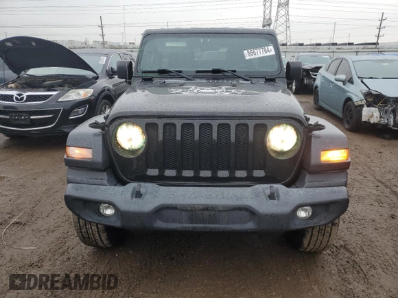 2019 Jeep Wrangler Unlimited Sport with VIN 1C4HJXDG8KW603584, listed as a Copart auction lot 86677784 with 85,182 mi miles and Salvage title. Bid and sale history available at DreamBid. Image 5.