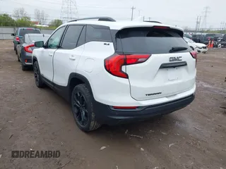 2021 GMC Terrain SLE with VIN 3GKALMEV9ML381769, listed as a IAAI auction lot 42011987 with 82,695 mi miles and . Bid and sale history available at carsss.com. Image 3.