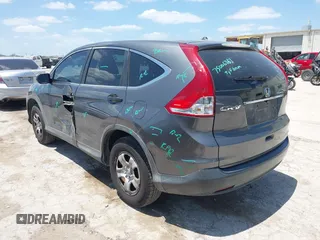 2013 Honda CR-V LX with VIN 3CZRM3H37DG708916, listed as a IAAI auction lot 42450090 with 118,002 mi miles and . Bid and sale history available at DreamBid. Image 3.