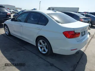 2014 BMW 3 Series 328i with VIN WBA3C1C52EK111076, listed as a IAAI auction lot 41817471 with 98,759 mi miles. Bid and sale history available at carsss.com. Image 3.