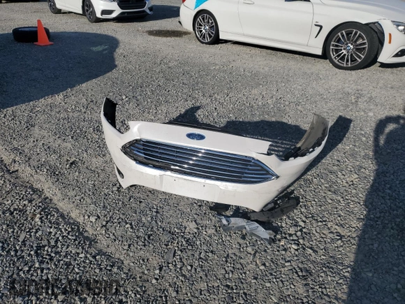 2015 Ford Focus Titanium z VIN 1FADP3N24FL262321, wystawiony jako Copart lot #59635525 z przebiegiem Nie podano mil oraz Szkoda całkowita • Salvage title. Historia ofert i sprzedaży dostępna na DreamBid. Obrazek 13.